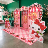 FoldWow cherry party backdrop with kitten cutout and pink checkered floor banner