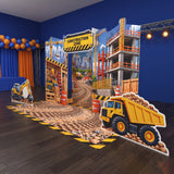FoldWow construction party backdrop with dump truck cutout and tire track floor banner