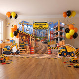 FoldWow Construction Zone backdrop with excavator and dump truck cutouts in a party room
