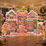 FoldWow Gingerbread Village backdrop at a holiday party with balloons and string lights