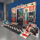 FoldWow Race Day race car birthday backdrop with pit stop garage, two car cutouts and starting grid banner