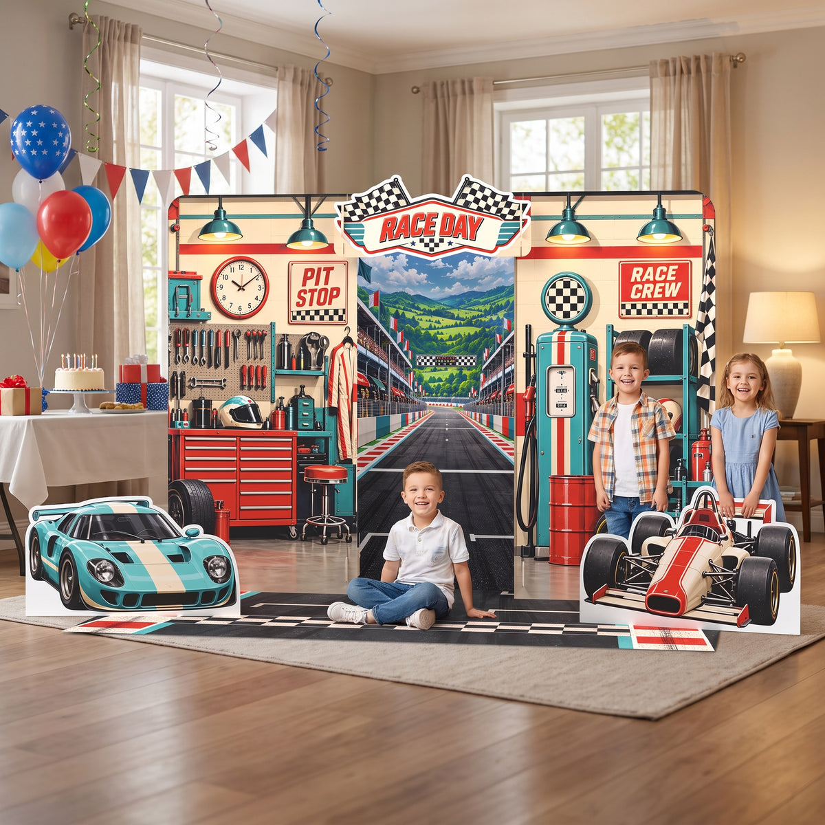 Kids posing at a race car birthday party in front of the FoldWow Race Day backdrop
