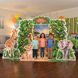 Kids posing in front of the FoldWow Wild Adventure safari party backdrop