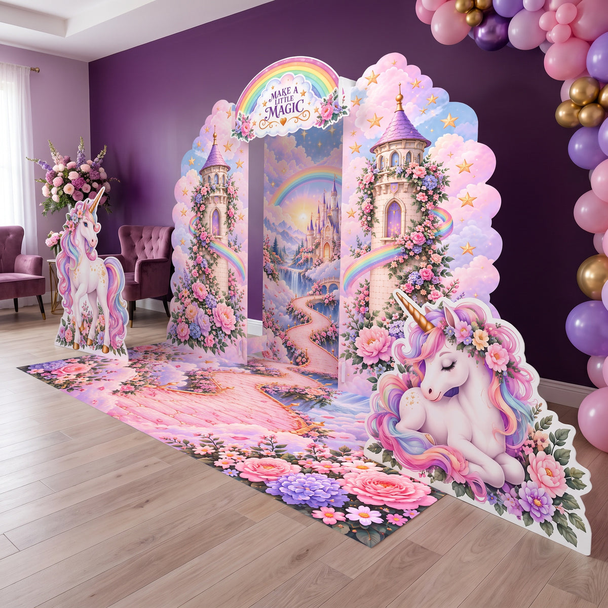 Unicorn rainbow birthday party scene with FoldWow Unicorn Magic backdrop and cutouts